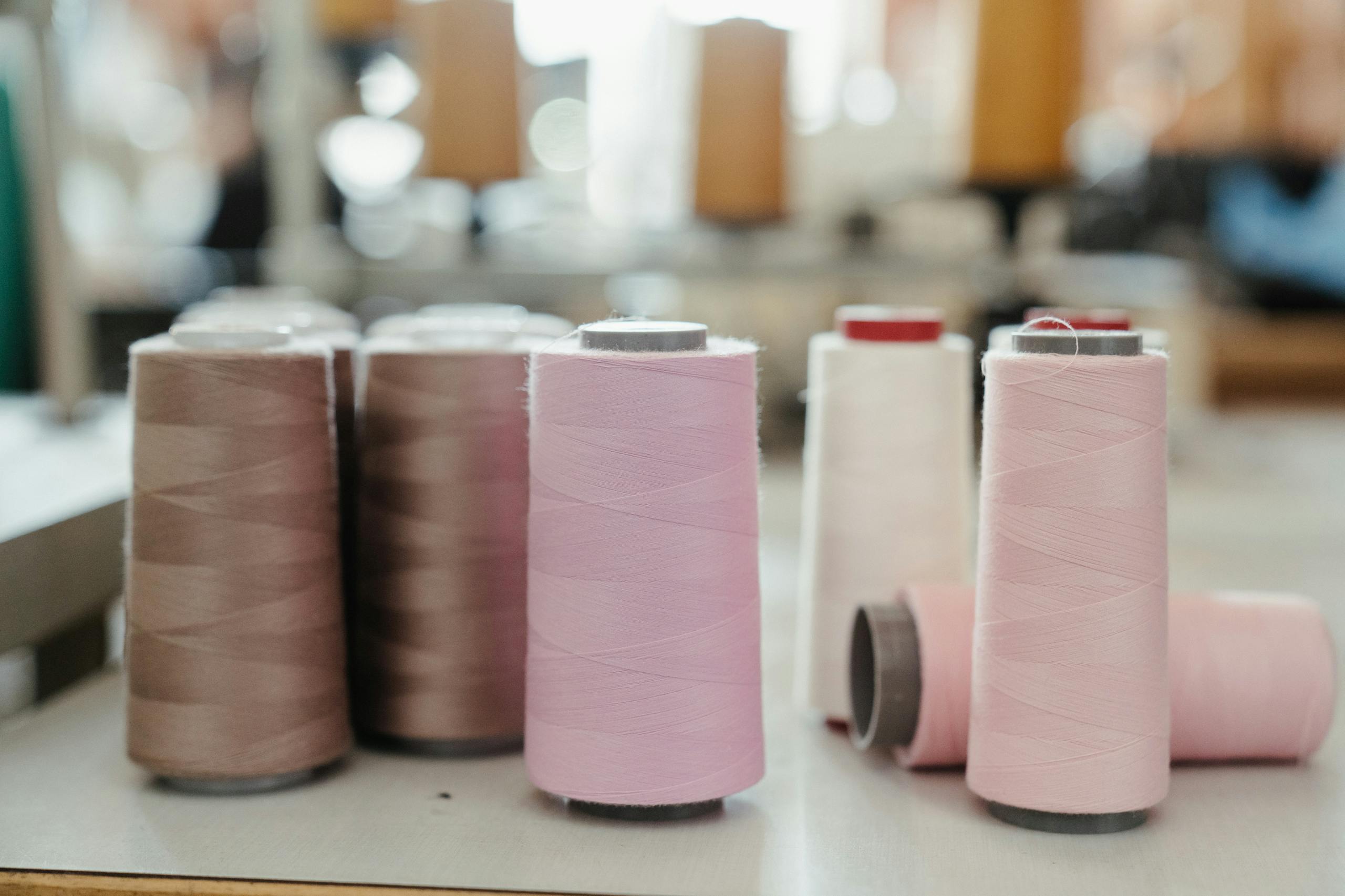 Pink Thread on White Table