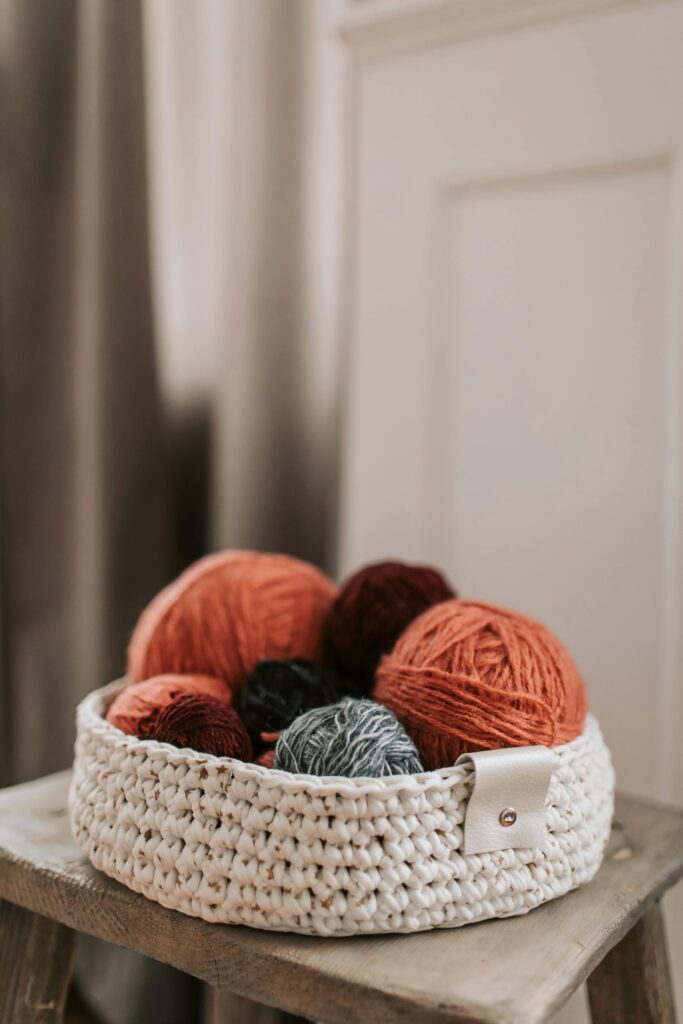 Yarns on White Woven Basket